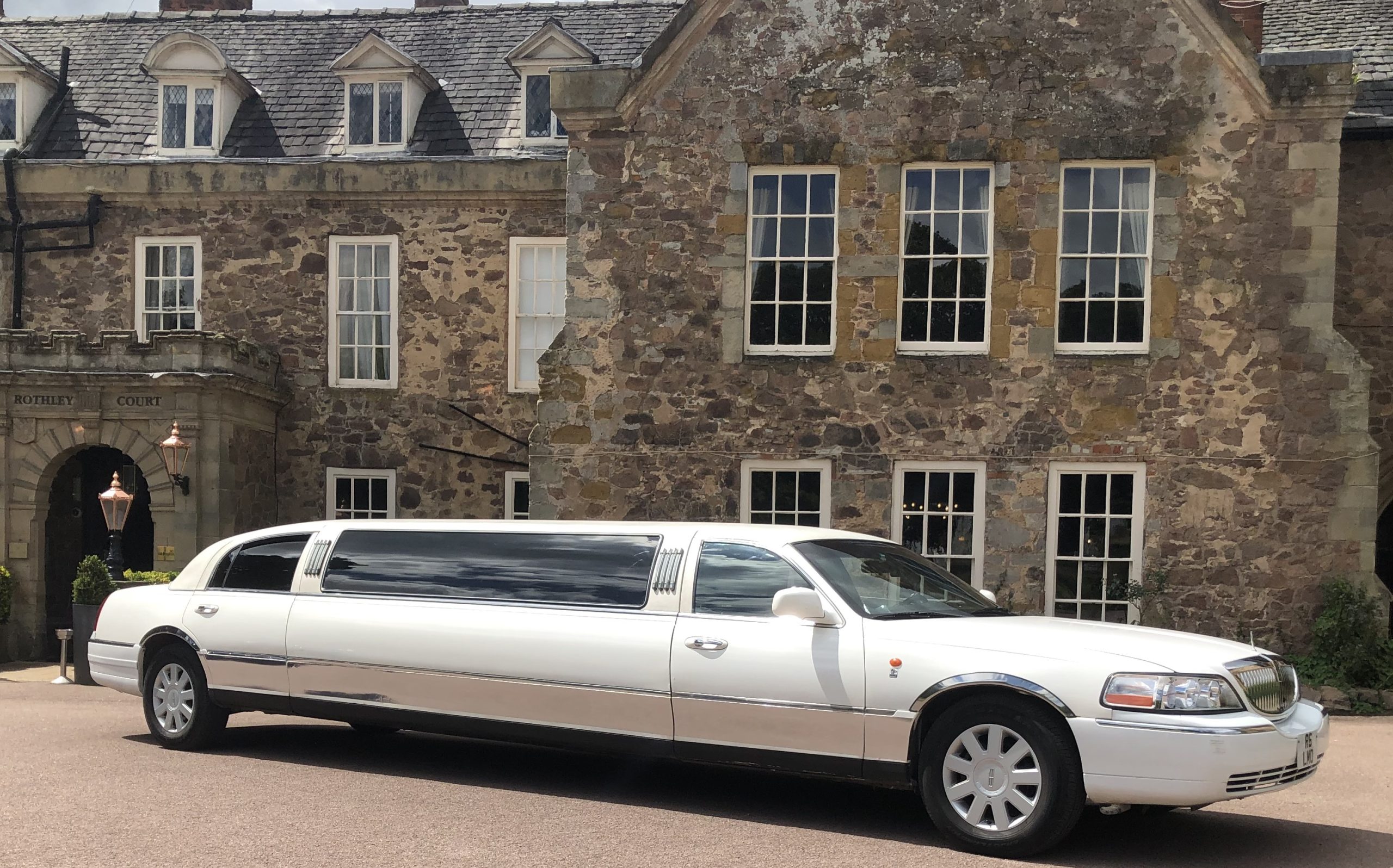 Nottingham Lincoln Town car beside park